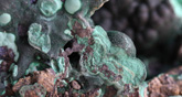 Image of a blue-green mineral containing copper, a material which can easily be analyzed by image analysis after proper sample preparation